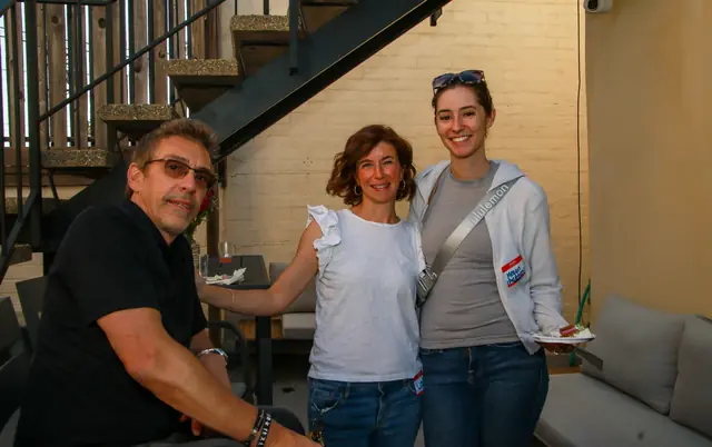 Guests relaxing on the patio at Bloom Loft