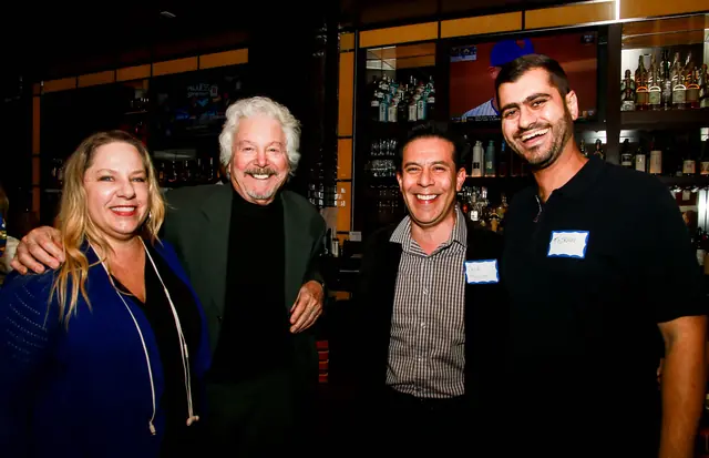 Members networking at the Capital Grille mixer