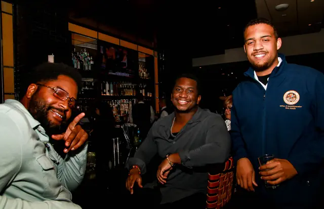 Guests enjoying the mixer at the Capital Grille