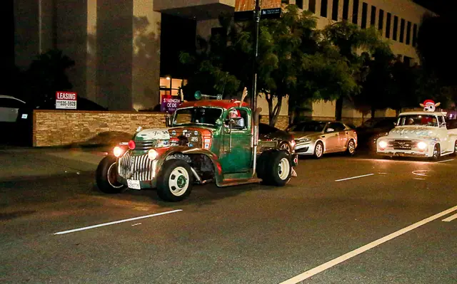 Vintage truck cruising Riverside Drive during the holiday kickoff