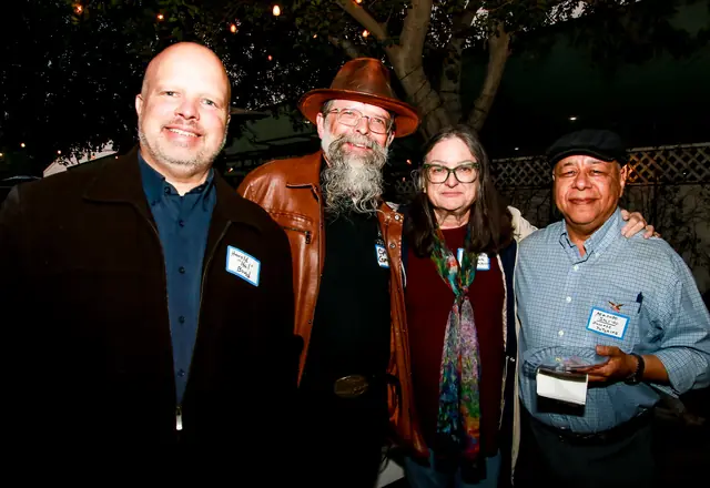 Members networking on the patio at the LAEC mixer