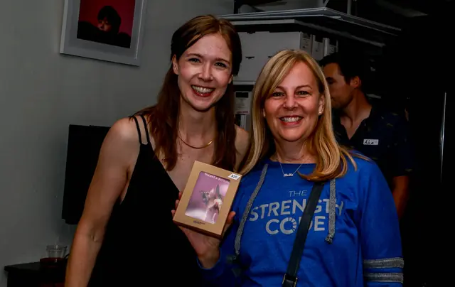Guests at the Shuttermutt Photo ribbon cutting reception