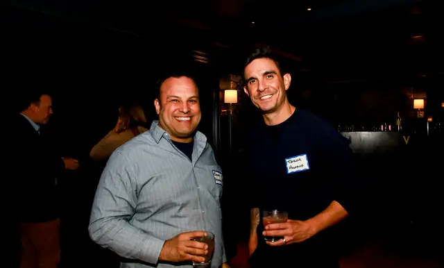 Members networking at the banner sponsor appreciation mixer