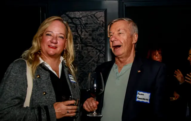 Guests sharing a laugh at the Verse mixer